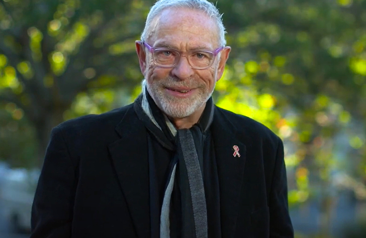 David Polson in 2018, standing outside and smiling.