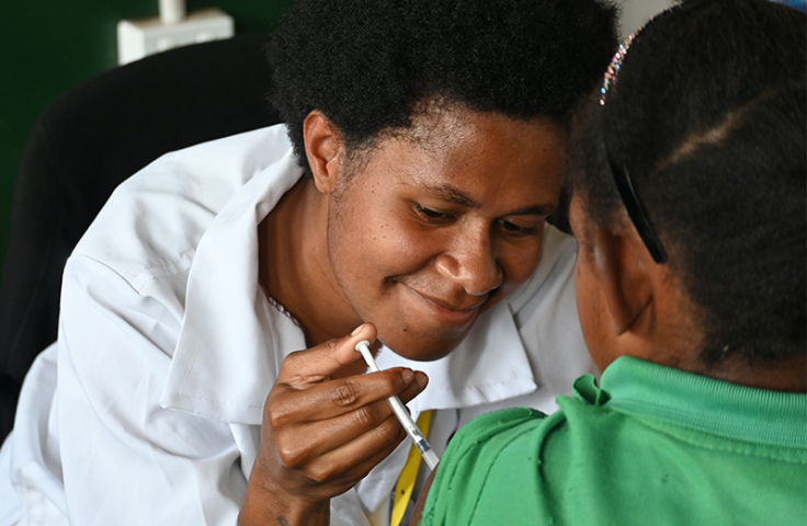 Young girl gets vaccinated from HPV in PNG